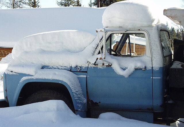 snow-covered pickup truck