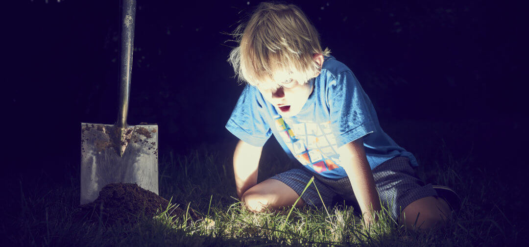 boy digging for treasure | 2018 Marketing Trends