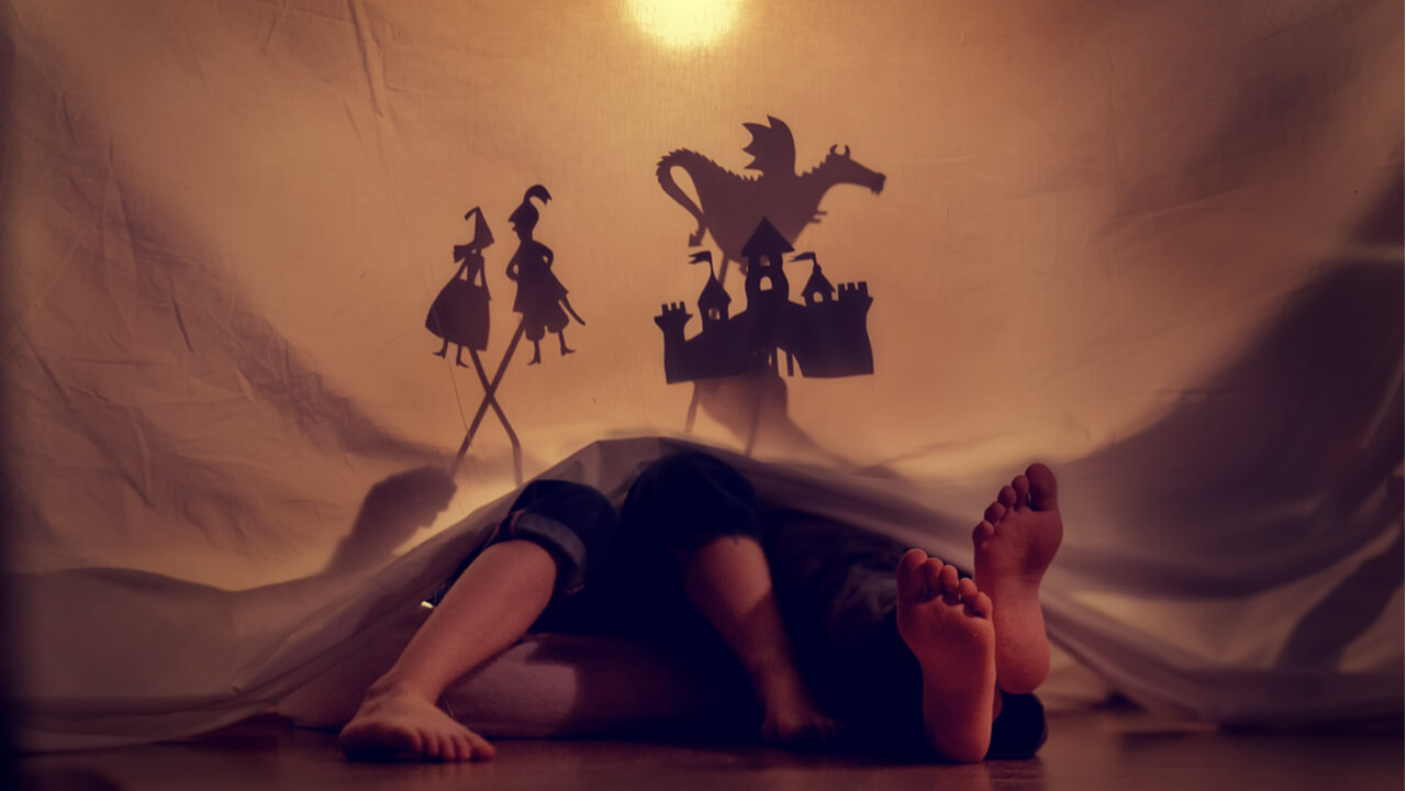 Children performing shadow theater | brand storytelling