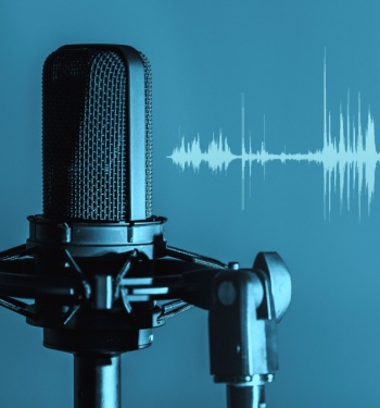 studio microphone on blue background with soundwave